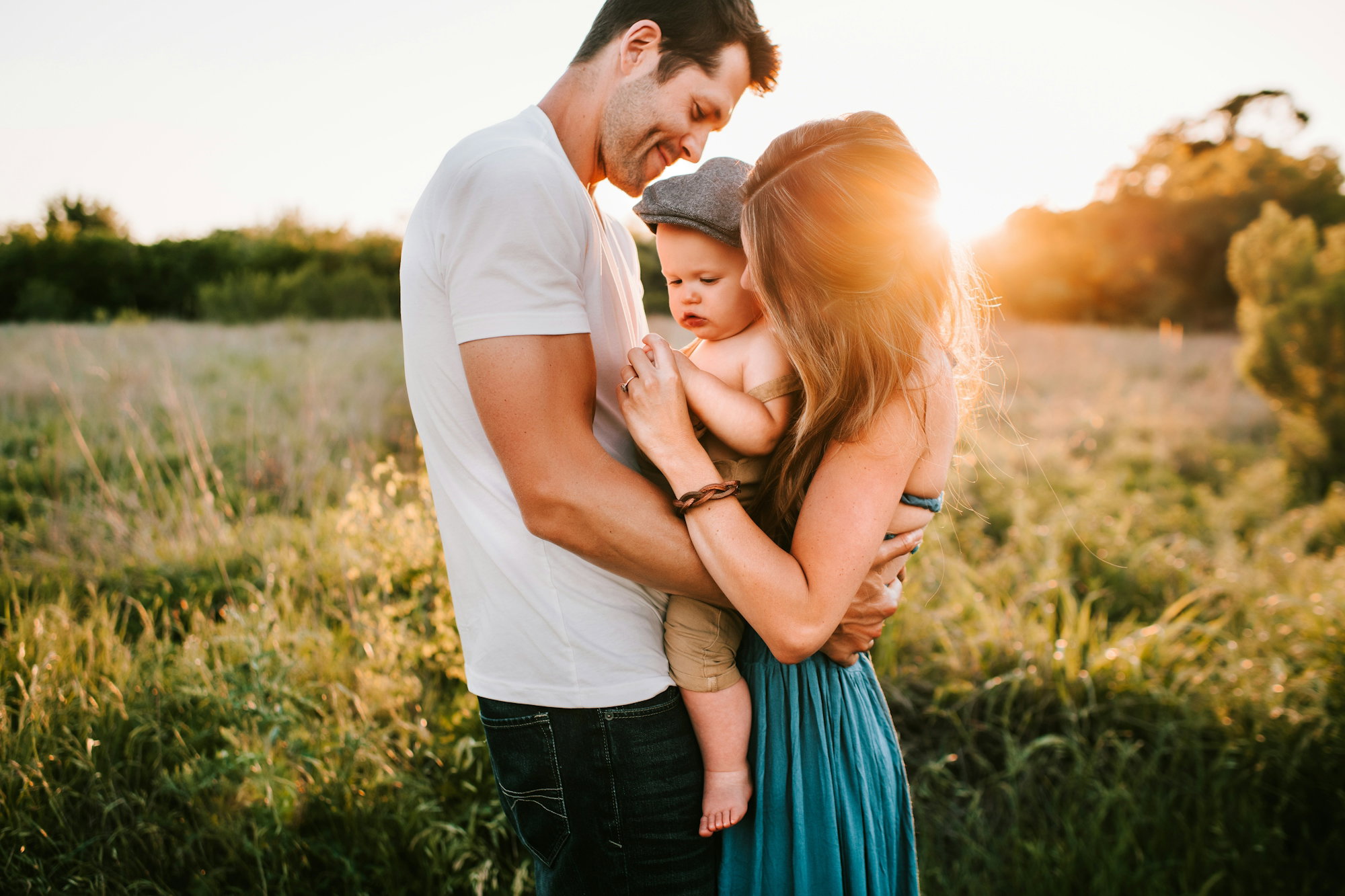 family-photo-on-green-grass-during-golden-hour.jpg family photo on green grass during golden hour